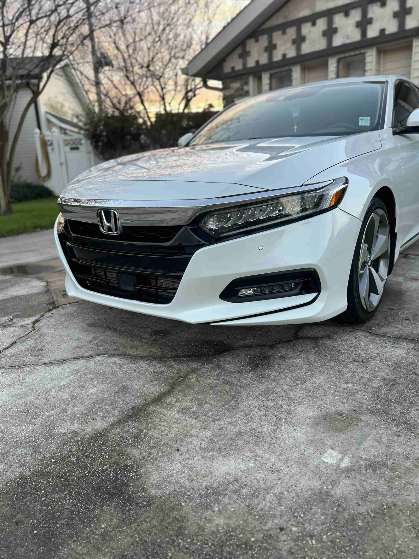 White Honda Accord with polished paint and clean wheels after a mobile car detail in Kenner, LA
