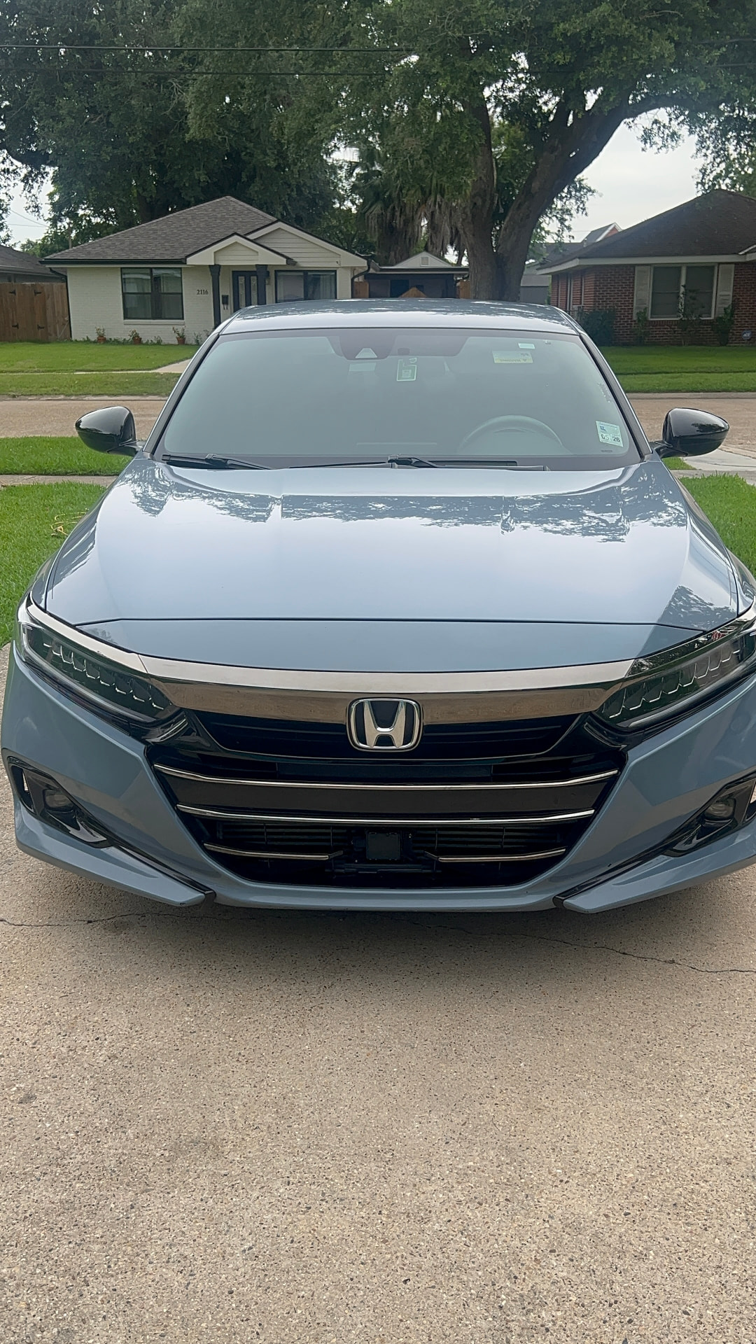 Sonic Gray Honda Accord front end after an exterior detail and glass cleaning in Kenner, Louisiana